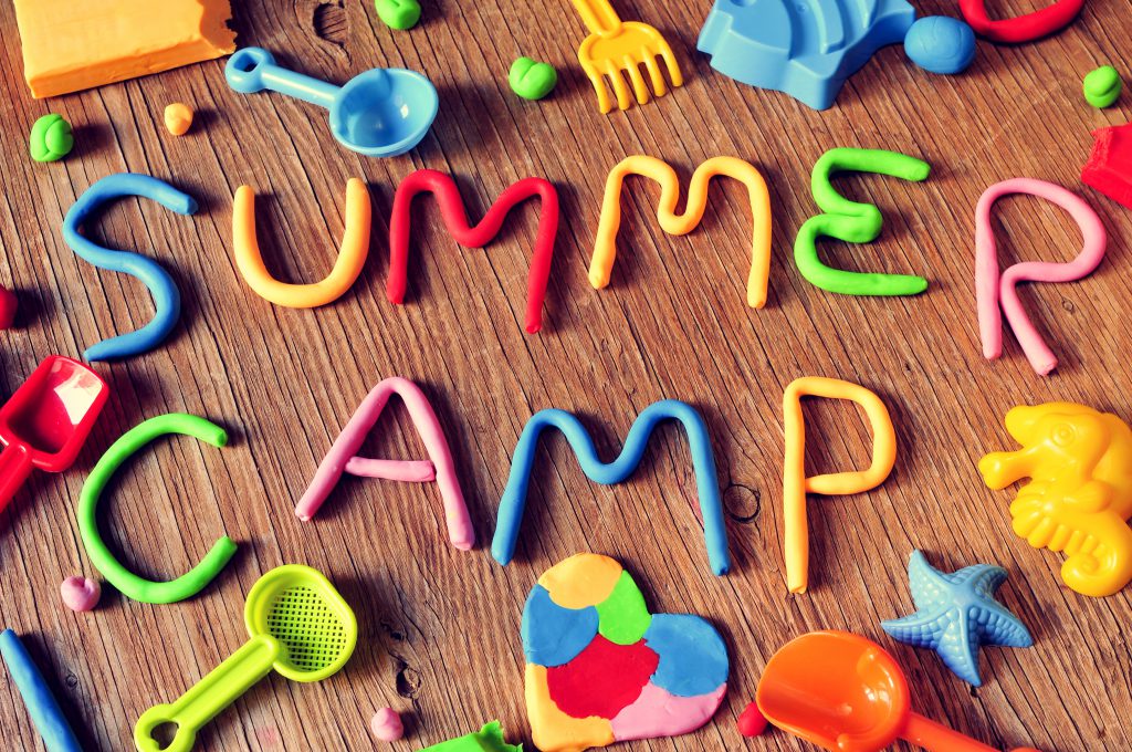 text summer camp made from modelling clay