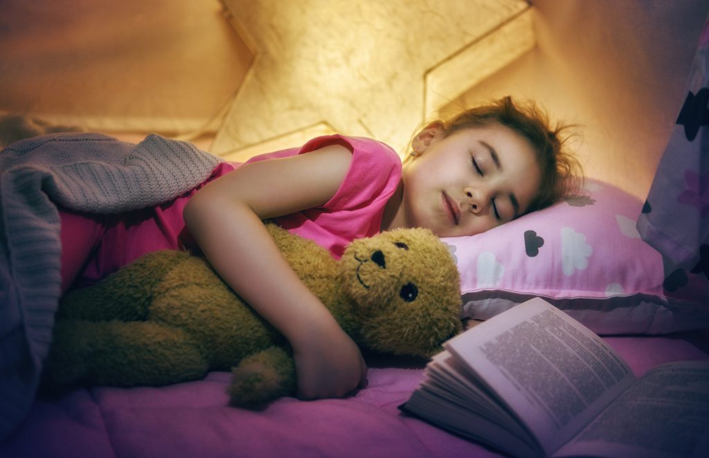 girl is napping in the tent