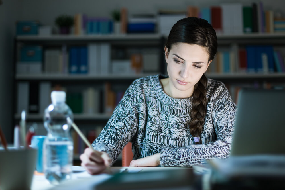 Teenager studying at home