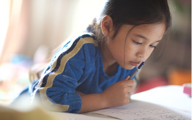 Elementary Schooler Studies at Home