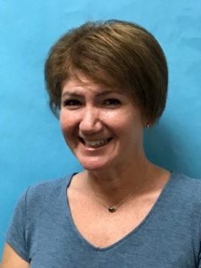 Headshot of J Russell, teacher