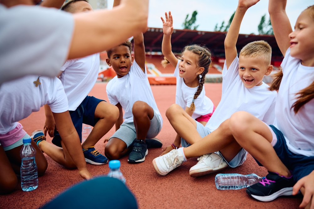 Young students on the track at school