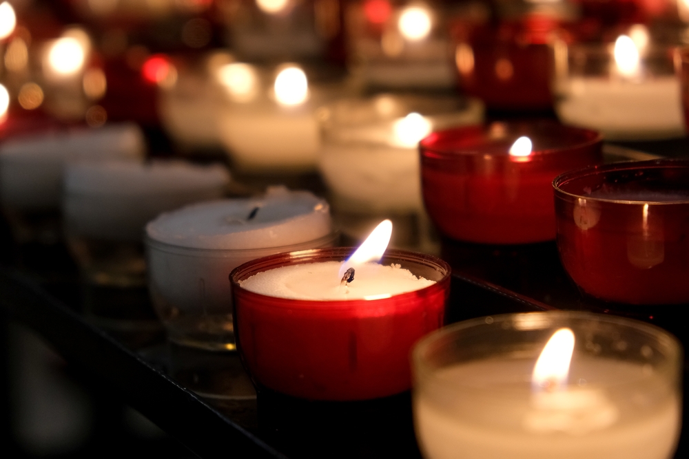 Red and white candles lit during a St. Valentine celebration